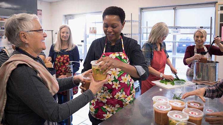 People volunteering at a charity.